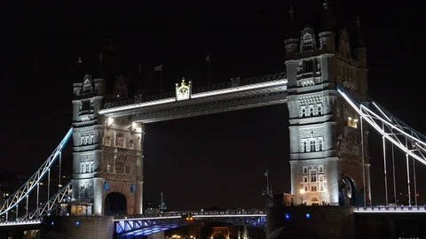 Tower Bridge In London By Night Thames River medium shot london bus Stock Footage