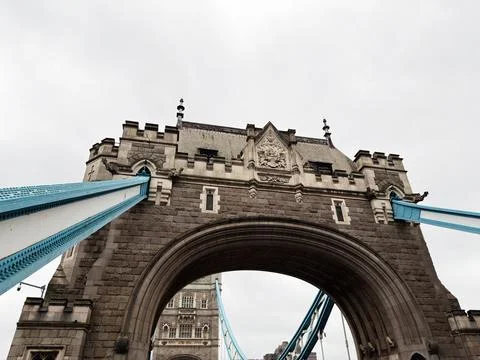 Tower Bridge in London UK with stone arch and blue suspension cables captur.. Stock Photos