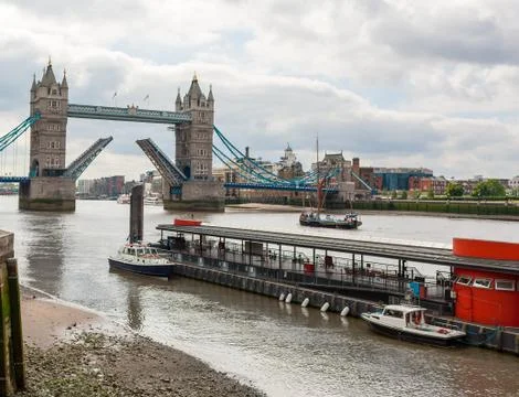 Tower Bridge open on River Thames, London, England Stock Photos