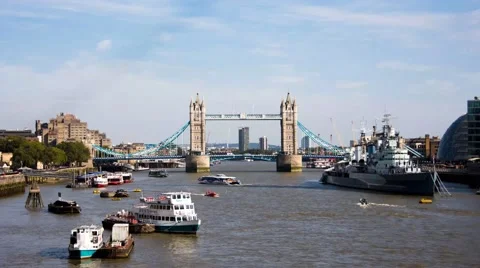 Tower Bridge seen from London Bridge with cruise boats, sky and clouds timelapse Stock Footage 68333511