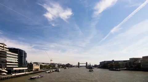Tower bridge seen from London bridge with boats, sky and clouds, timelapse Stock Footage 68385426
