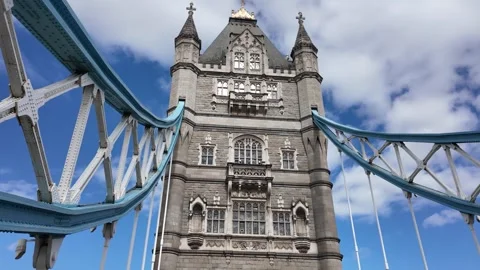 Tower Bridge tower and suspension trusses in dynamic upward tracking shot Stock Footage 346677487