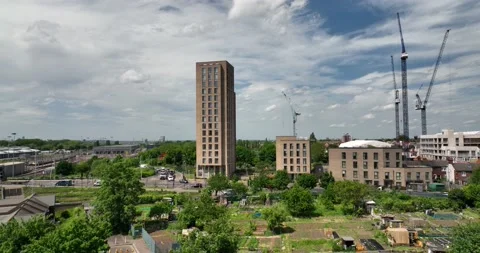 Tower building with horizontal office and green trees in the large city Stock-Footage 201468790