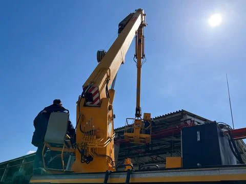 A tower car is a car equipped with a device for lifting and moving workers Stock Photos
