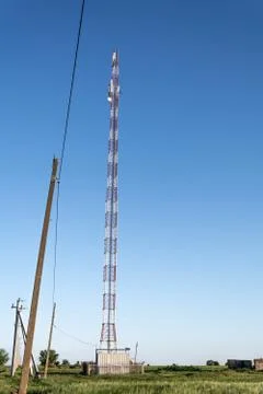 The tower of cellular communication on the background of the blue sky, Ukrain Stock Photos