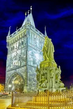 Tower on Charles Bridge at nighttime. Stock Photos