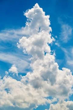 Tower of clouds in the sky, unusual cloud in the form of a tower, large cumul Stock Photos