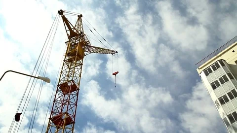 Tower crane against the sky. Stockbeeldmateriaal 75024333