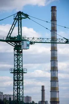 Tower crane on the background of the city Stock Photos