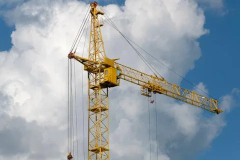 Tower crane on a background of clouds Stock Photos