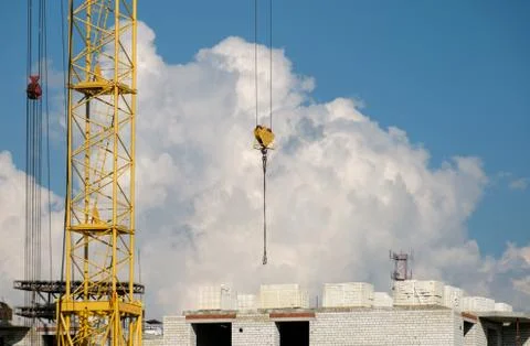 Tower crane on a background of clouds Stock Photos