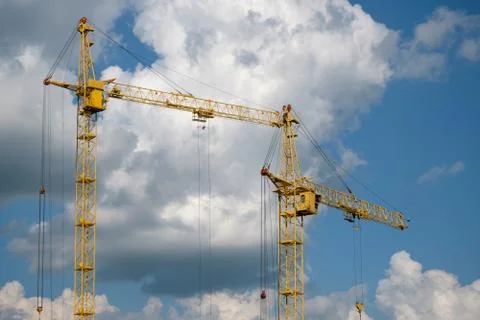 Tower crane on a background of clouds Stock Photos