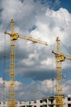 Tower crane on a background of clouds Stock Photos