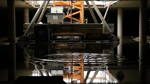 Tower Crane Base Foundation riflection in Water Stock Footage 95839151
