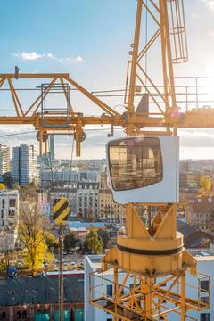 Tower crane cabin close up, construction of multi-storey buildings Stock Photos