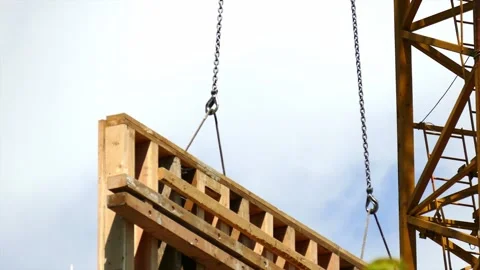 Tower crane carrying a load. Stock-Footage 145299723