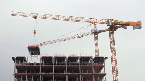 Tower crane constructing a high rise building. Stock Footage 98449500