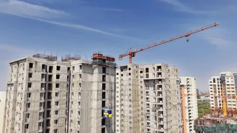 Tower Crane Constructing Tall Residential Apartment Highrise Towers In A Growing Stock Footage 341389328