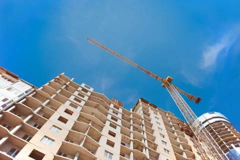 Tower crane on the construction area Stock Photos