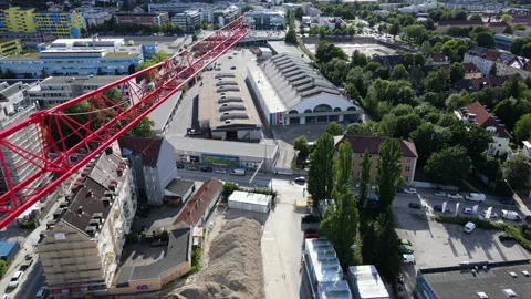 Tower crane at construction site, building yard, Aerial drone shot in 4k, urban Video stock 168630318
