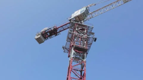 Tower crane at a construction site. Construction crane. Tower crane working on a Video stock 201849993
