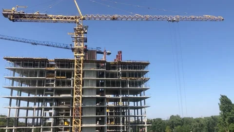 Tower crane at the construction site. Construction of a high-rise residential Video stock 202612068