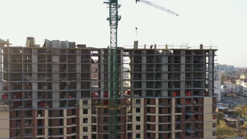 Tower crane at a construction site Stock Footage 142285305