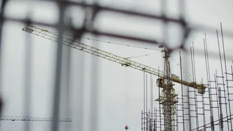 Tower crane at construction site Stock Footage 327747316