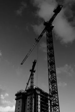 Tower crane at the construction site of a multi-storey residential building Stock-Fotos