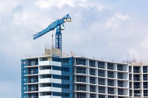 Tower crane at the construction site of a multistory building Fotos de archivo