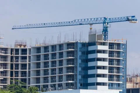 Tower crane at the construction site of a multistory building Fotos de archivo