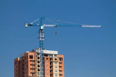 Tower crane on a construction site Stock Photos