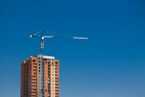 Tower crane on a construction site Stock Photos