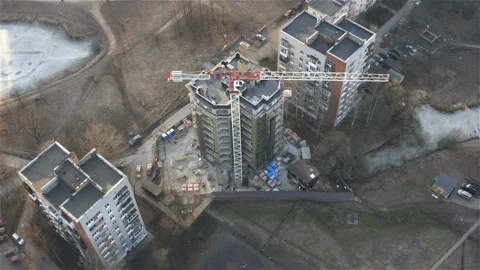 Tower crane at the construction site of a skyscraper. Aerial survey Stock Footage 113489971