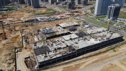 Tower crane during construction of a residential building. Construction site. Stockbeeldmateriaal 156630918