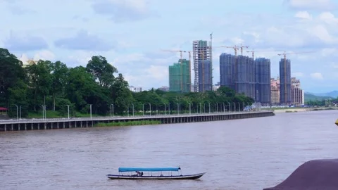Tower crane lifting at the construction site of a tall building. Stock Footage 279636625