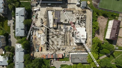 Tower crane over construction site aerial view Stock Footage 221853691