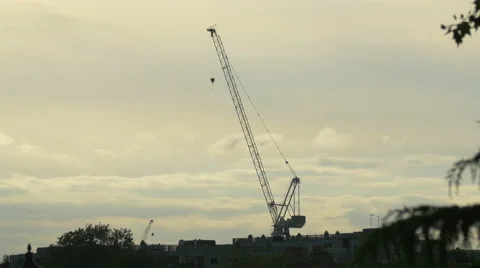 Tower crane seen on a cloudy sky background in London Stock Footage 61052443