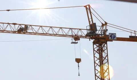 Tower crane with a sun effect Фото