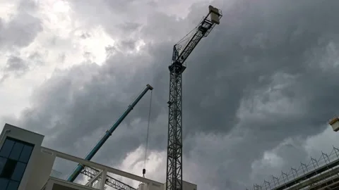 Tower Crane Working at Construction Residential Site During a Cloudy Day Stock Footage 144609015