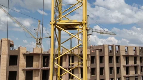 Tower crane working at construction site Stock Footage 247895716