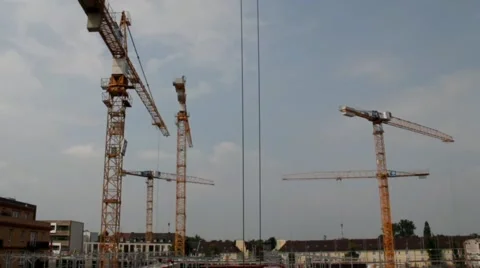 Tower cranes are working on the construction of residential building Stock Footage 40518073