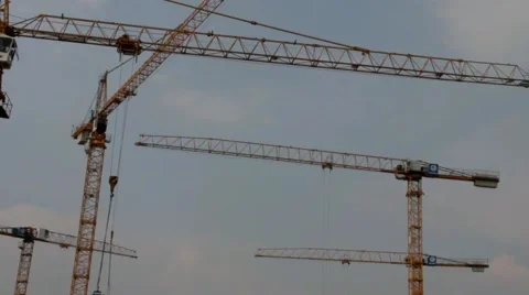 Tower cranes are working on the construction of residential building Stock Footage 40518494
