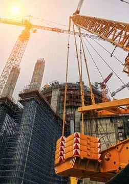 Tower cranes on the background of the cooling tower. Foto stock