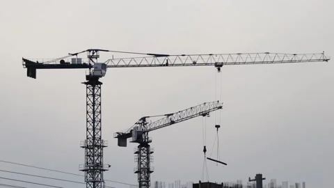 Tower cranes on the construction of the building Stock Footage 151144975