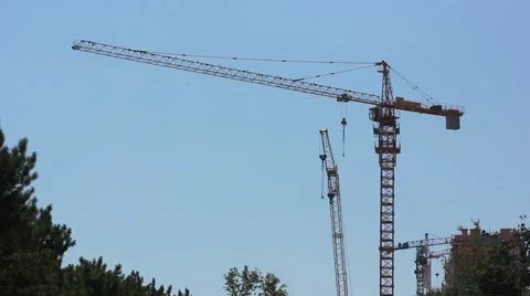 Tower cranes on construction site Stock Footage 45576607