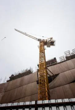 Tower cranes at construction site Stock Photos