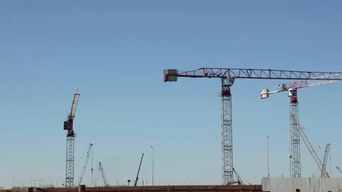 Tower cranes on a construction site, Timelapse. Urban development concept Stock Footage 171639830