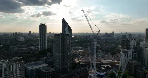 Tower cranes at construction site at twilight Video stock 201902105
