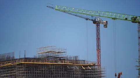 Tower cranes construction timelapse. Footage of a large construction site with Stock Footage 246297314